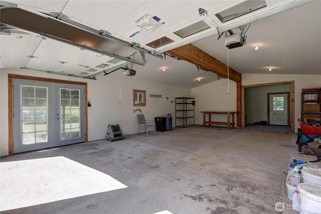 905 Bywater Way, Port Ludlow, WA 98365 - garage with french doors and a garage door opener