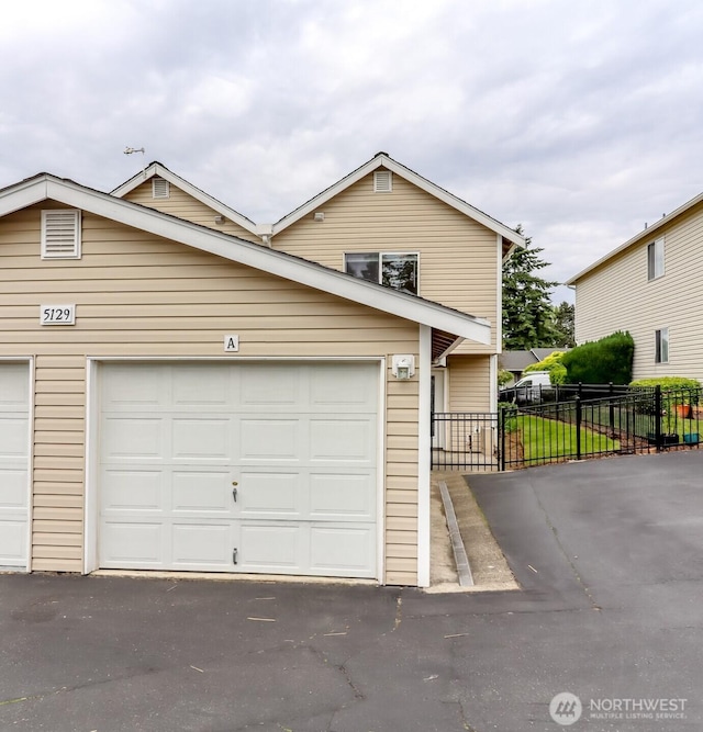 5129 Green Hills Ave NE Unit A, Tacoma, WA 98422 - traditional-style house featuring asphalt driveway