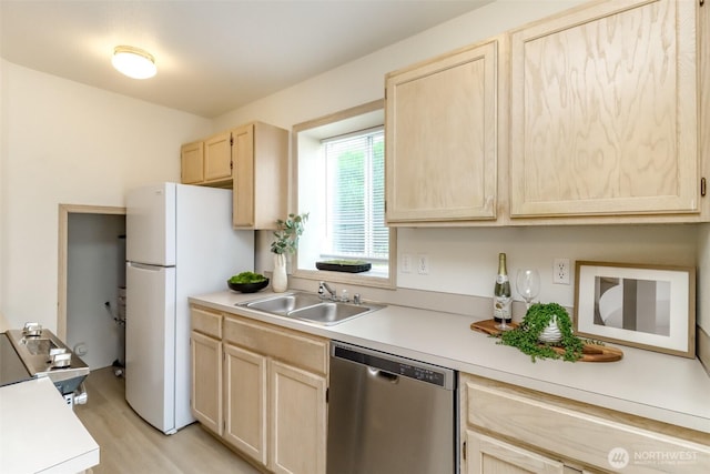 5129 Green Hills Ave NE Unit A, Tacoma, WA 98422 - kitchen featuring stainless steel dishwasher, light brown cabinets, a sink, and light countertops
