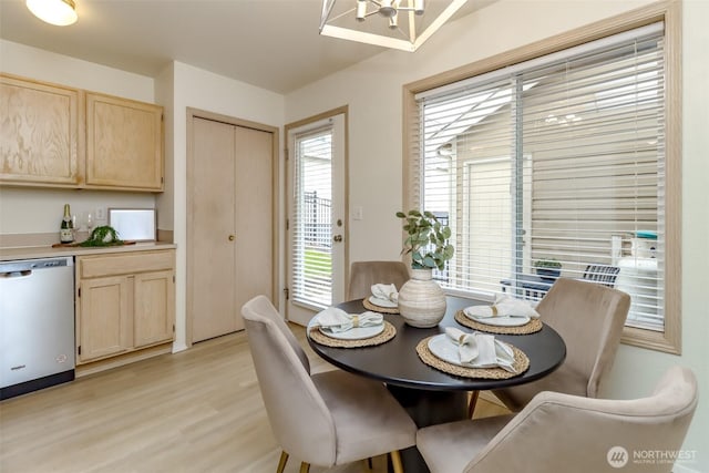 5129 Green Hills Ave NE Unit A, Tacoma, WA 98422 - dining room featuring light wood-style flooring and a chandelier