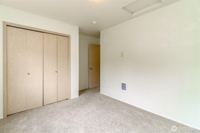 5129 Green Hills Ave NE Unit A, Tacoma, WA 98422 - unfurnished bedroom with attic access, carpet, and a closet