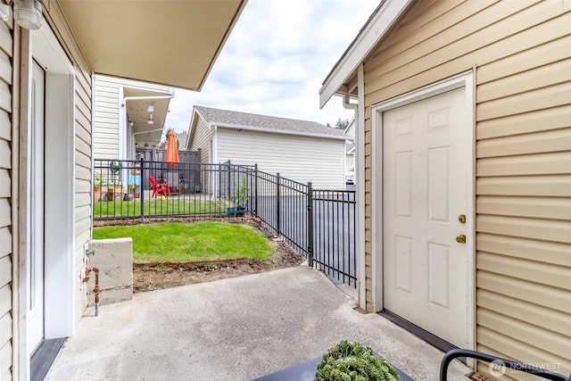 5129 Green Hills Ave NE Unit A, Tacoma, WA 98422 - view of exterior entry featuring a patio