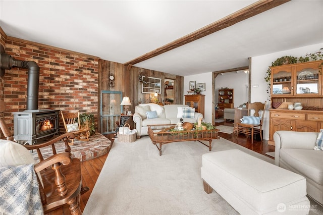 17257 Olympic View Rd NW, Silverdale, WA 98383 - living area with a wood stove and wood finished floors