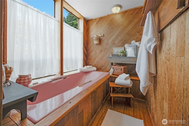 17257 Olympic View Rd NW, Silverdale, WA 98383 - bathroom with wood-type flooring and wooden walls