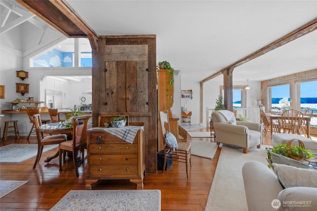 17257 Olympic View Rd NW, Silverdale, WA 98383 - dining area with hardwood / wood-style flooring and a high ceiling
