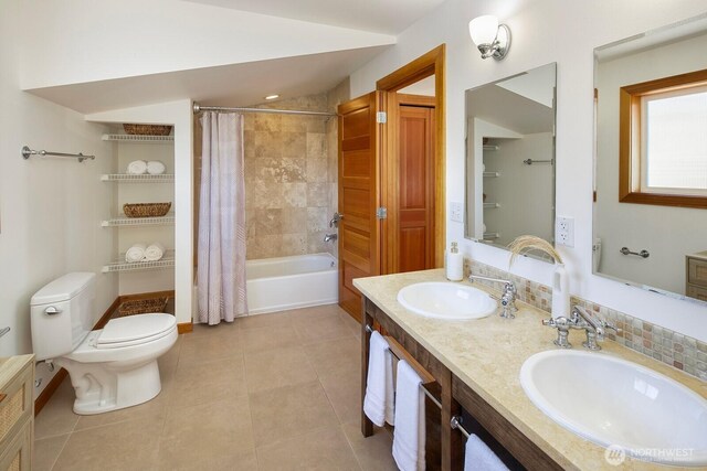 1414 25th Ave Unit B, Seattle, WA 98122 - bathroom featuring double vanity, shower / bathtub combination with curtain, and tile patterned floors