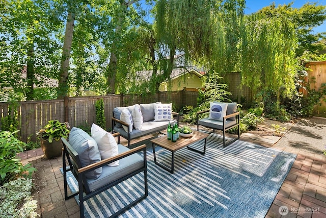 1414 25th Ave Unit B, Seattle, WA 98122 - fenced backyard with outdoor lounge area and a patio area