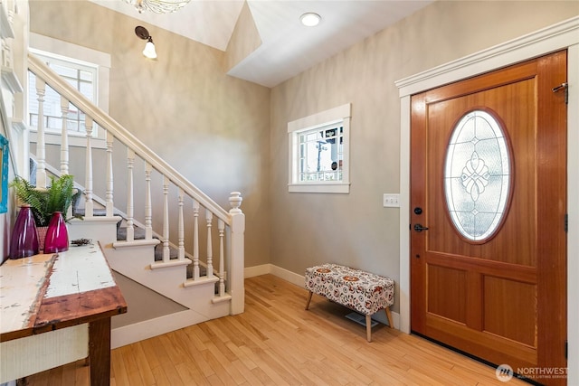 805 11th St, Bellingham, WA 98225 - entryway featuring baseboards, light wood-type flooring, and stairway