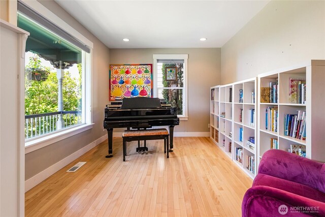 805 11th St, Bellingham, WA 98225 - living area with plenty of natural light, baseboards, wood finished floors, and recessed lighting