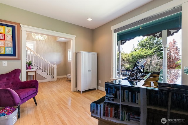 805 11th St, Bellingham, WA 98225 - living area with a chandelier, stairway, wood finished floors, baseboards, and recessed lighting