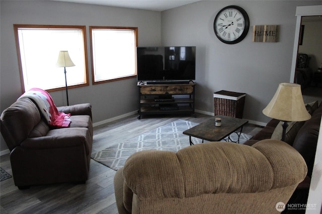 306 E 5th St, Lind, WA 99341 - living room featuring wood finished floors and baseboards