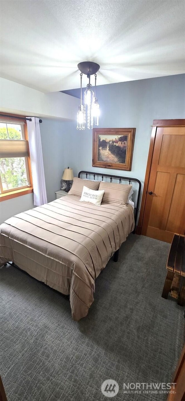 8145 Chehalis Rd, Blaine, WA 98230 - carpeted bedroom with a textured ceiling