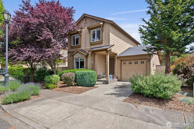 6600 Carolina St SE, Lacey, WA 98513 - view of front of home with an attached garage and concrete driveway