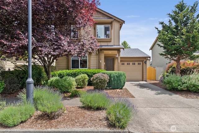 6600 Carolina St SE, Lacey, WA 98513 - view of front facade with a garage and concrete driveway