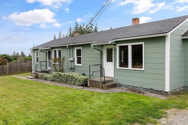 4191 N Imperial Ln, Oak Harbor, WA 98277 - back of house with a chimney and roof with shingles
