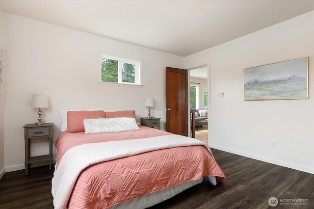 4191 N Imperial Ln, Oak Harbor, WA 98277 - bedroom with wood finished floors, multiple windows, and baseboards