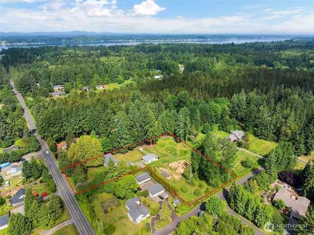 1804 36th Ave NE, Olympia, WA 98506 - view of property location with a forest, a nearby body of water, and property parcel outlined