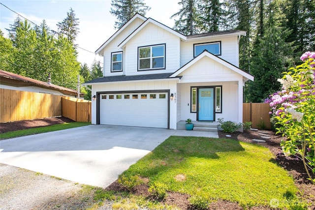 8367 Dolphin Way, Maple Falls, WA 98266 - traditional-style house with an attached garage, driveway, and board and batten siding
