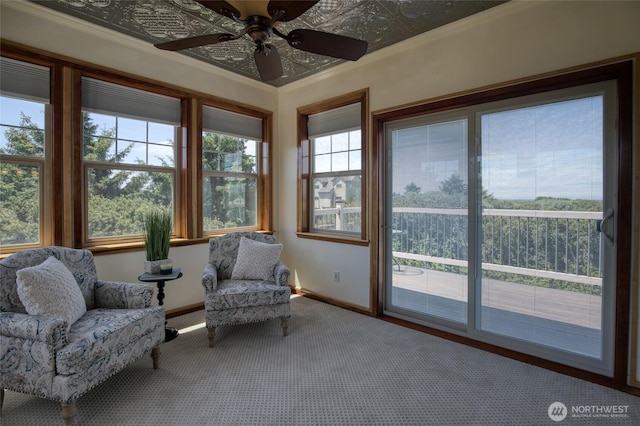 144 Sand Dune Ave SW, Ocean Shores, WA 98569 - sitting room with carpet floors, a ceiling fan, baseboards, and ornamental molding