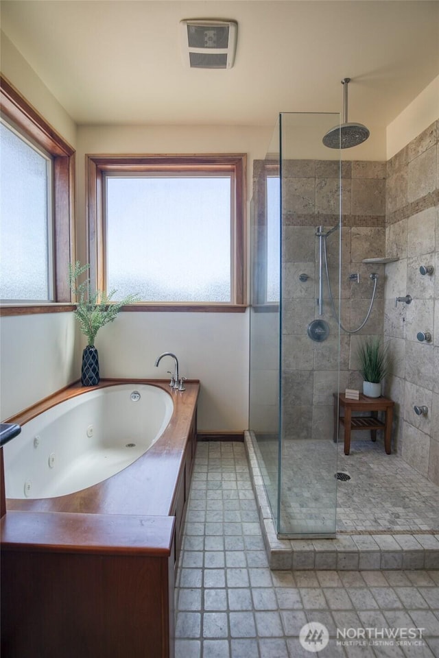 144 Sand Dune Ave SW, Ocean Shores, WA 98569 - bathroom featuring a stall shower and a jetted tub