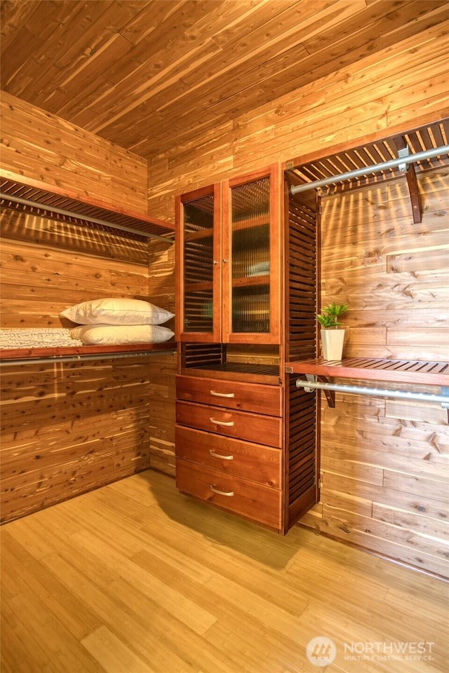 144 Sand Dune Ave SW, Ocean Shores, WA 98569 - walk in closet with light wood finished floors