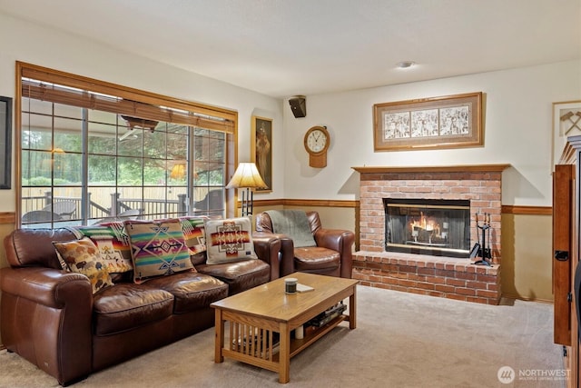 14406 144th St E, Orting, WA 98360 - living area featuring a fireplace and carpet