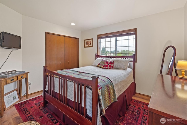 14406 144th St E, Orting, WA 98360 - bedroom with a closet, recessed lighting, and wood finished floors