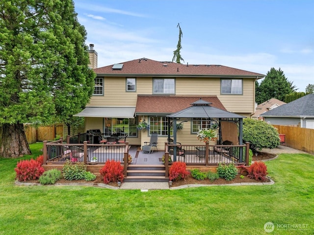 14406 144th St E, Orting, WA 98360 - rear view of house featuring a gazebo, a chimney, and a wooden deck