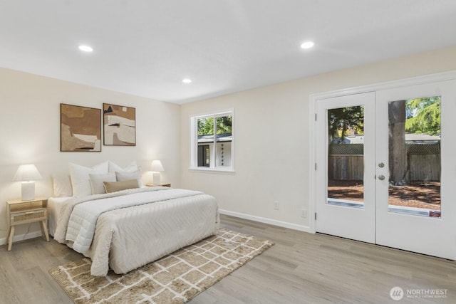 16828 Ambaum Blvd S, Burien, WA 98148 - bedroom with access to outside, light wood-style floors, recessed lighting, and french doors