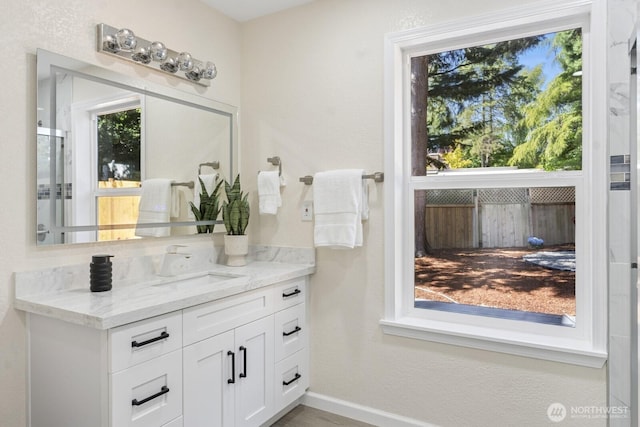 16828 Ambaum Blvd S, Burien, WA 98148 - bathroom featuring vanity and baseboards