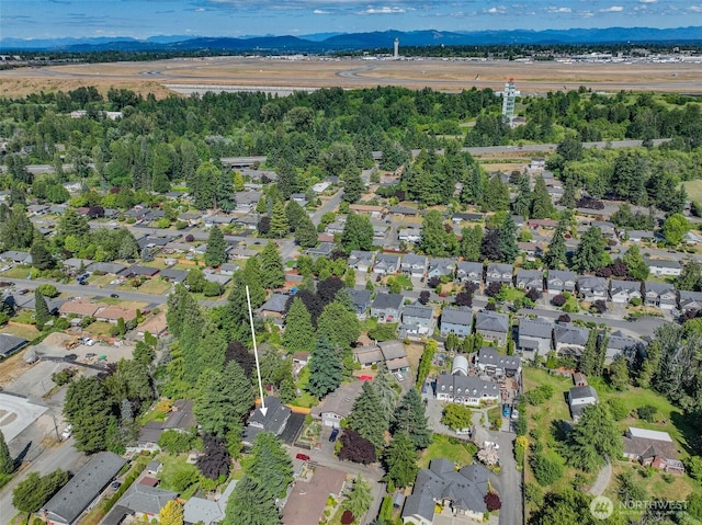 16828 Ambaum Blvd S, Burien, WA 98148 - aerial overview of property's location with mountains