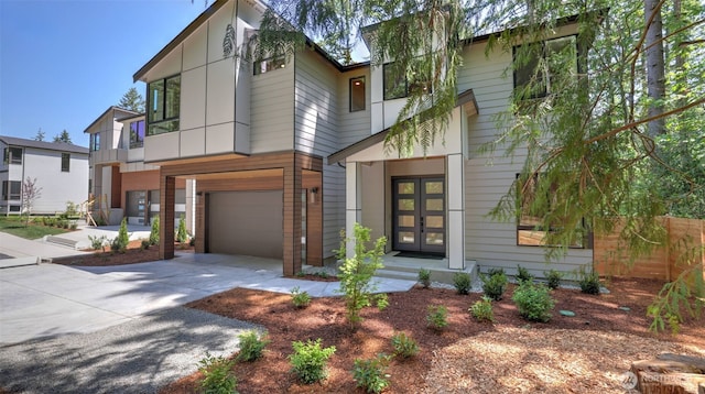 1542 213th Ct NE, Sammamish, WA 98074 - contemporary home with french doors, a garage, and concrete driveway