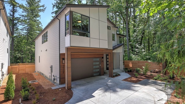 1542 213th Ct NE, Sammamish, WA 98074 - contemporary home featuring an attached garage and driveway
