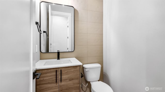 1542 213th Ct NE, Sammamish, WA 98074 - half bathroom featuring toilet, vanity, and tile walls
