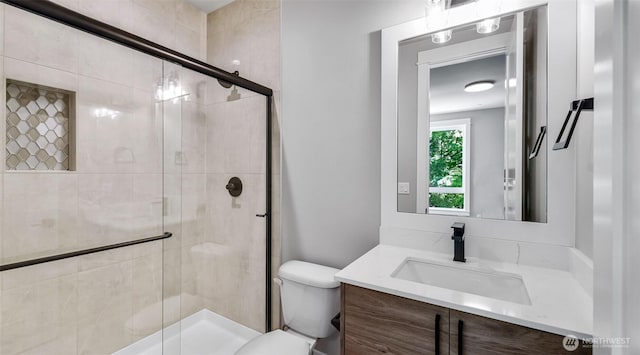 1542 213th Ct NE, Sammamish, WA 98074 - bathroom featuring toilet, vanity, and a stall shower
