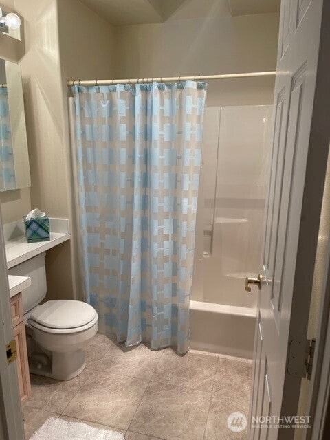 304 Sr 150 Unit 1A, Chelan, WA 98816 - full bath with vanity, toilet, shower / tub combo with curtain, and tile patterned flooring
