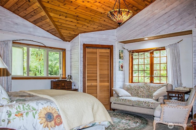 70 Cole Ave, Port Townsend, WA 98368 - bedroom with wood ceiling, wood walls, a closet, and high vaulted ceiling