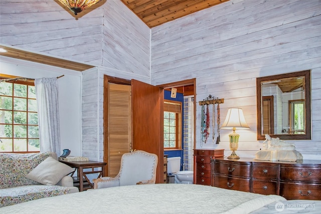 70 Cole Ave, Port Townsend, WA 98368 - bedroom with wood walls, wooden ceiling, and multiple windows
