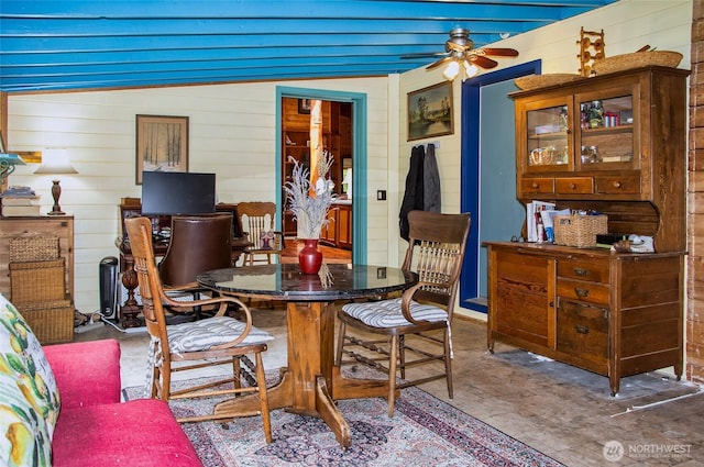 70 Cole Ave, Port Townsend, WA 98368 - dining space with wood walls and ceiling fan