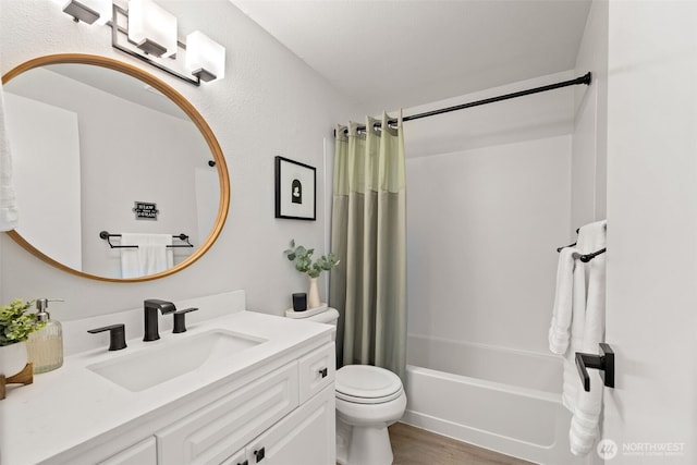 23311 Cedar Way Unit P201, Mountlake Terrace, WA 98043 - full bathroom featuring toilet, vanity, shower / bath combo, and wood finished floors