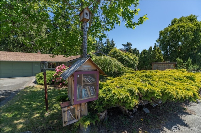 4404 Lopez St, Port Townsend, WA 98368 - view of outbuilding featuring a garage and driveway