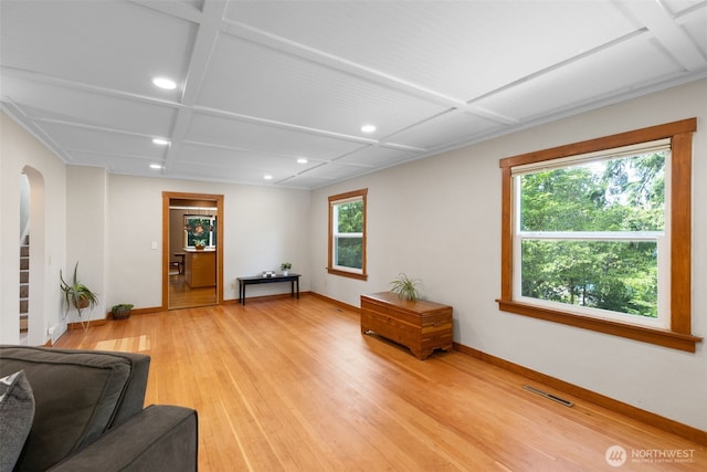 1010 Tacoma Ave, Port Orchard, WA 98366 - living room with arched walkways, healthy amount of natural light, recessed lighting, baseboards, and light wood finished floors