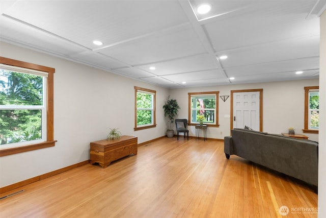 1010 Tacoma Ave, Port Orchard, WA 98366 - living area featuring light wood-type flooring, healthy amount of natural light, coffered ceiling, recessed lighting, and baseboards