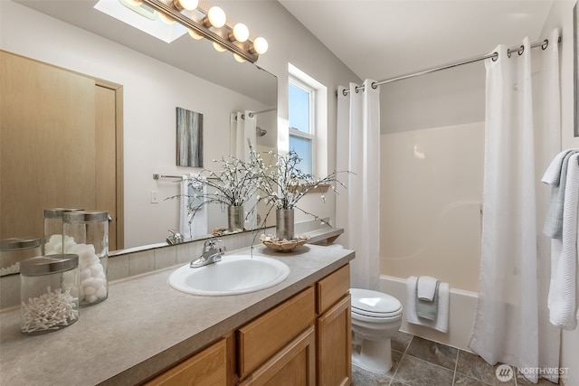 10049 17th Ave SW, Seattle, WA 98146 - bathroom featuring vanity, toilet, and shower / tub combo with curtain