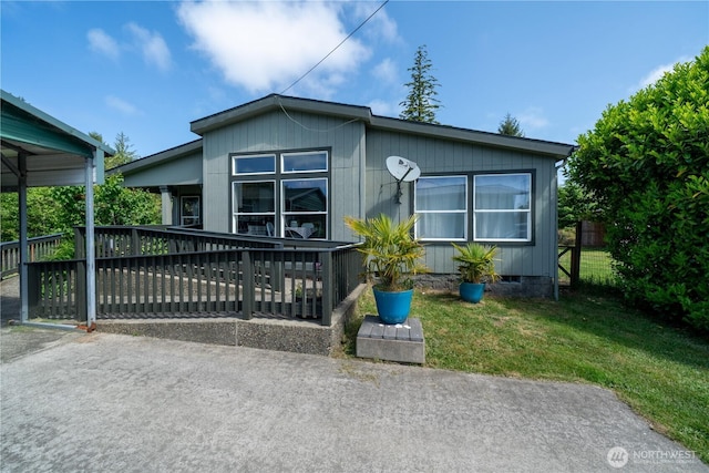 10419 Sandridge Rd, Long Beach, WA 98631 - manufactured / mobile home featuring a front lawn