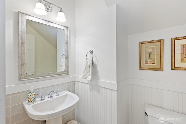 1747 Parade Grounds Ave NE, Bainbridge Island, WA 98110 - half bath featuring wainscoting and lofted ceiling