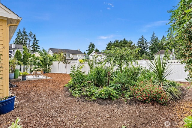 1747 Parade Grounds Ave NE, Bainbridge Island, WA 98110 - fenced backyard with a patio and a residential view