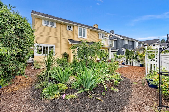 1747 Parade Grounds Ave NE, Bainbridge Island, WA 98110 - back of property featuring a chimney