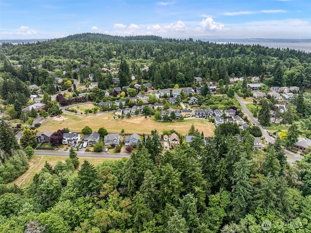 1747 Parade Grounds Ave NE, Bainbridge Island, WA 98110 - aerial view of property and surrounding area featuring nearby suburban area and a large body of water