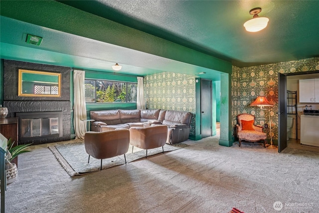 29103 46th Pl S, Auburn, WA 98001 - living room featuring a large fireplace, carpet, and a textured ceiling